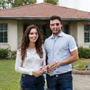 Young couple celebrating home purchase
